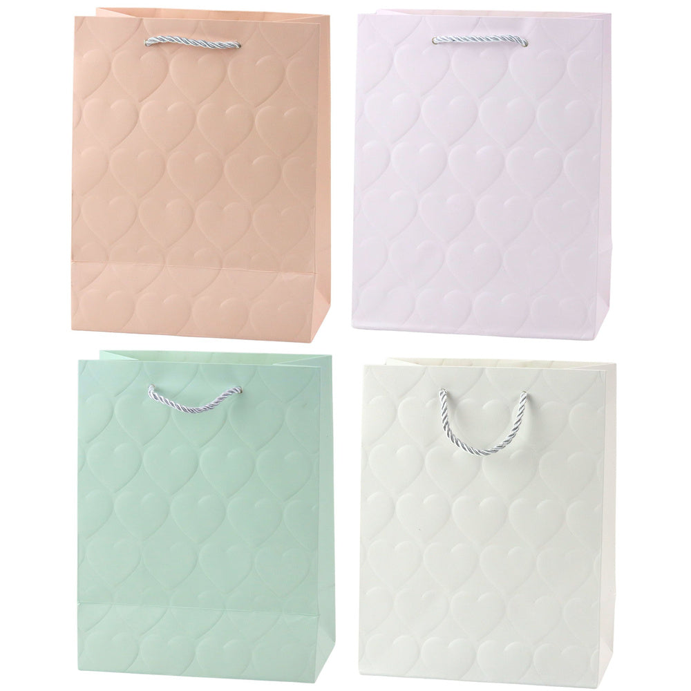 Elegant gift bag with embossed hearts, 23 x 18 x 10.5 cm